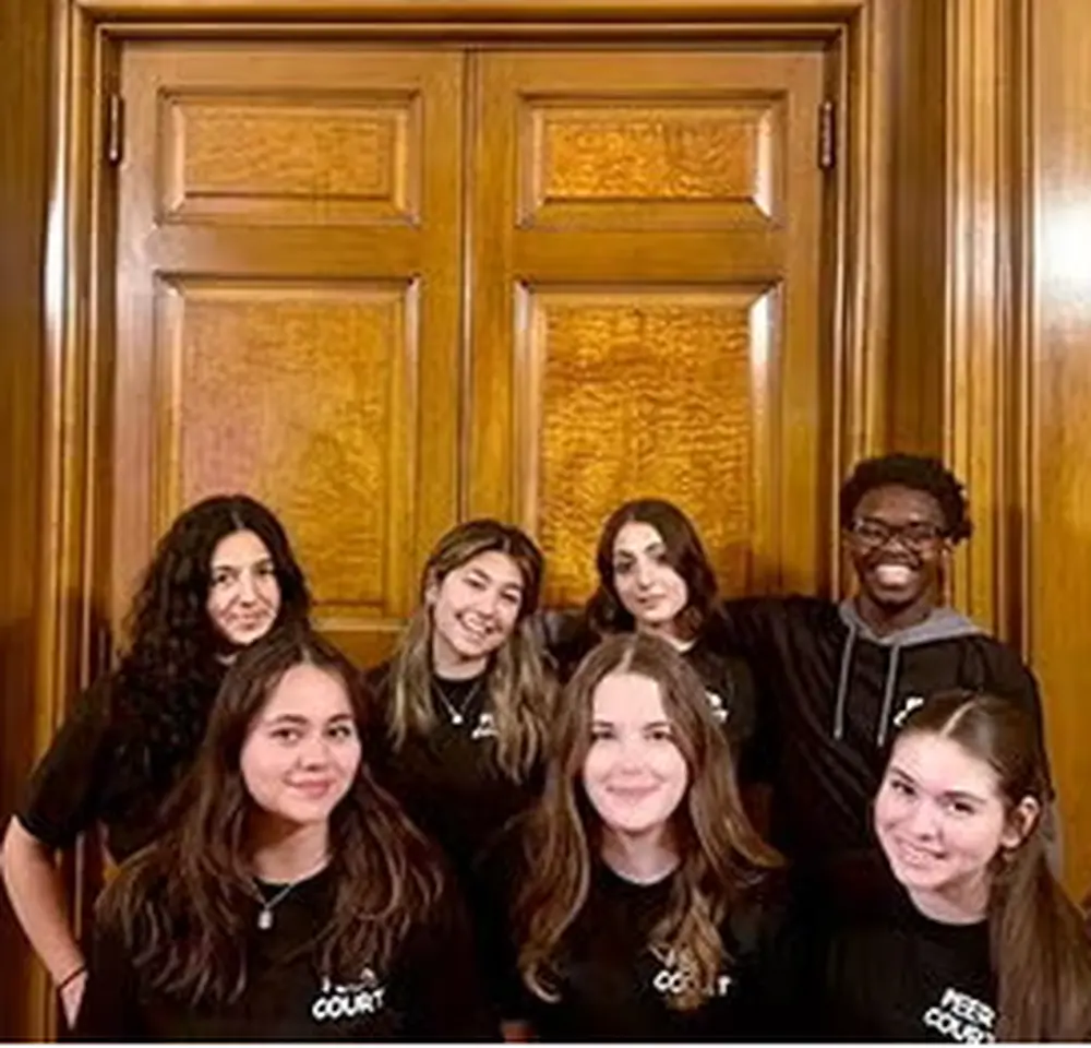 Pictured are Angelina Correa (bottom left), Meghan Kimbler (bottom middle), Mia Anguiano (bottom right), Janari Anderson (top right), Meena Joudeh (top middle-right), Liz Byrne (top middle-left), and Stephanie Filtcheva (top left). 